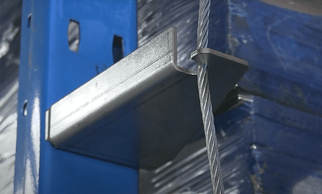 Close-up shot of a side bracket with cable hooked on.