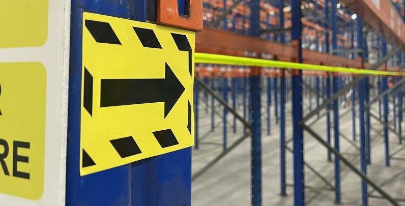 The SprinklerShield™ is a high-visibility racking safety wire system designed to provide an immediate physical and visual warning to forklift operators.